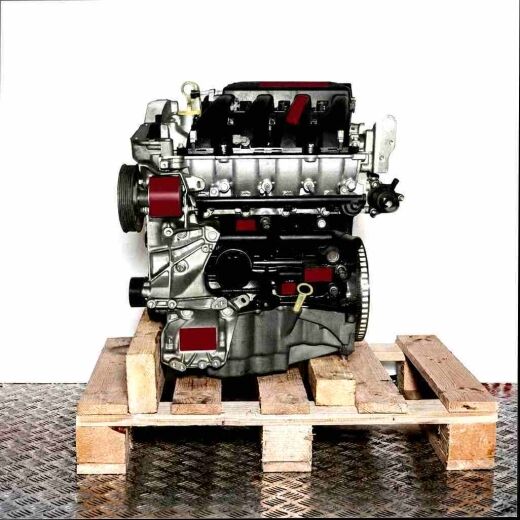 K4J 710 engine on a wooden pallet, white background. Side view of the engine, perfect for parts and repairs.