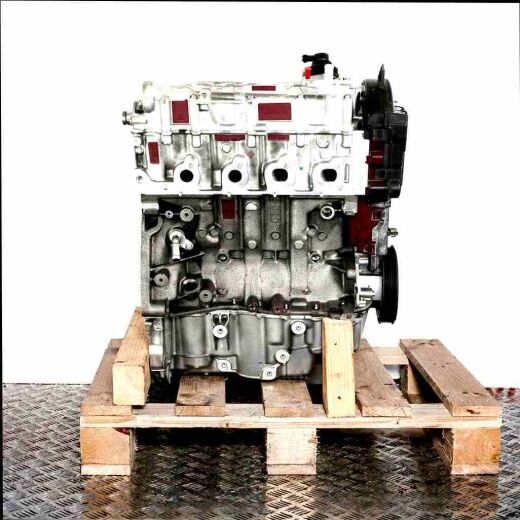 K9K 612 engine on a wooden pallet against a white background. The silver and black engine is viewed from the side.