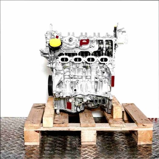 M 282.914 engine on a wooden pallet against a white background. The grey engine with black and yellow accents features a yellow oil cap. Side view.