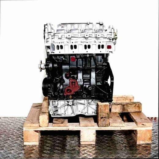M9T 670 engine on a wooden pallet against a white background. The silver top and black bottom of the engine are visible.