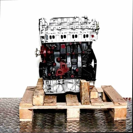 M9T 678 engine on a wooden pallet against a white background. Side view of the engine, oriented vertically.