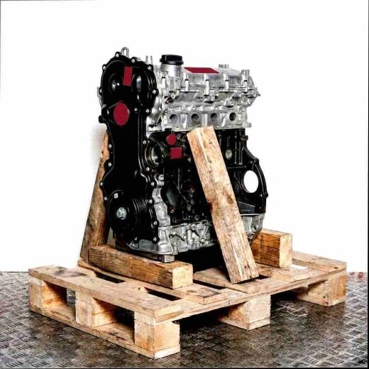 M9T 704 engine on wooden pallet against a white background. Complete engine, side view.