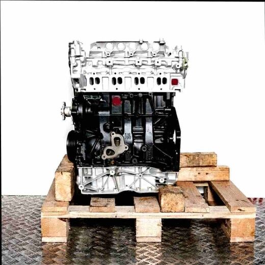 Side view of engine M9T 706 on a wooden pallet against a white background. The engine features silver and black components.