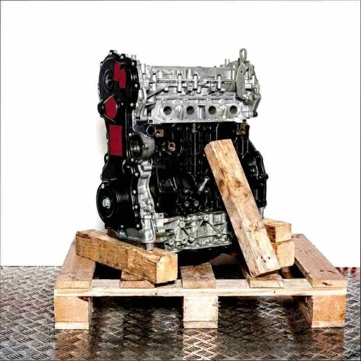 M9T 716 engine on a wooden pallet against a white background. Side view of the engine, slightly angled from the front.