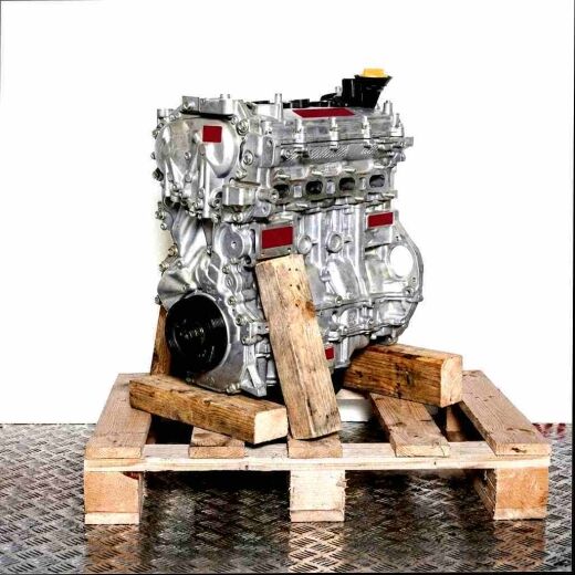 MR16DDT engine on a wooden pallet against a white background. The silver engine, featuring bolts and a yellow cap, is viewed from the side.