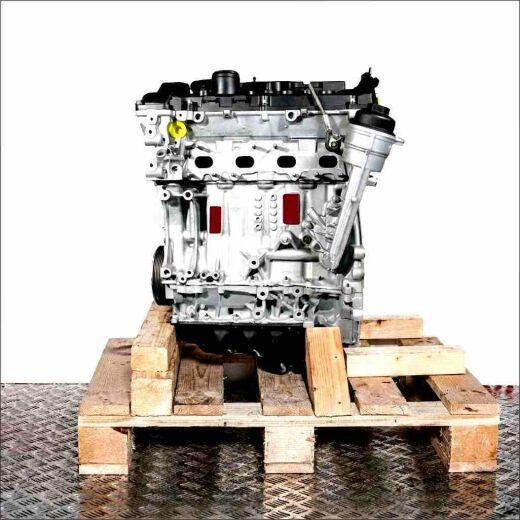 N13 B16 A engine on a wooden pallet against a white background. This side view shows the intact, gray engine with black and yellow accents.
