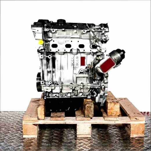 Side view of an N14 B16 A engine on a wooden pallet against a white background. The engine is vertically oriented.