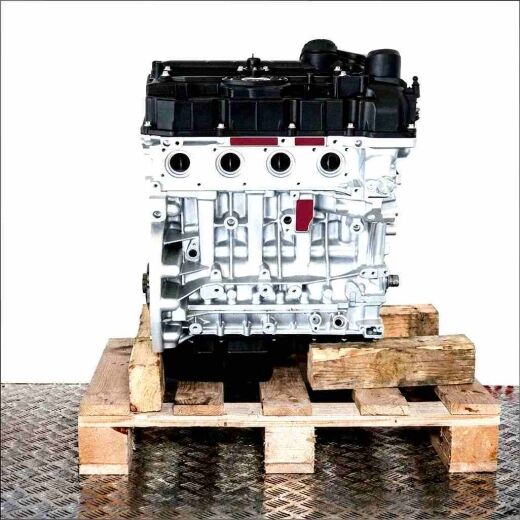 N26 B20 A engine on a wooden pallet against a white background. The silver and black engine is viewed from the side, vertically aligned.