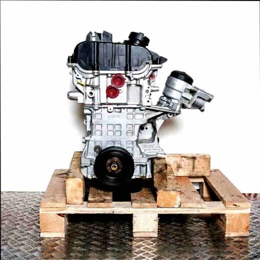 Side view of an N43 B20 A engine on a wooden pallet against a white background. The engine is vertically oriented.