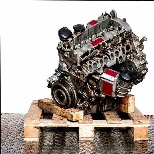 N47 C20 A engine on a wooden pallet against a white background. The image shows the engine from a slightly angled perspective.