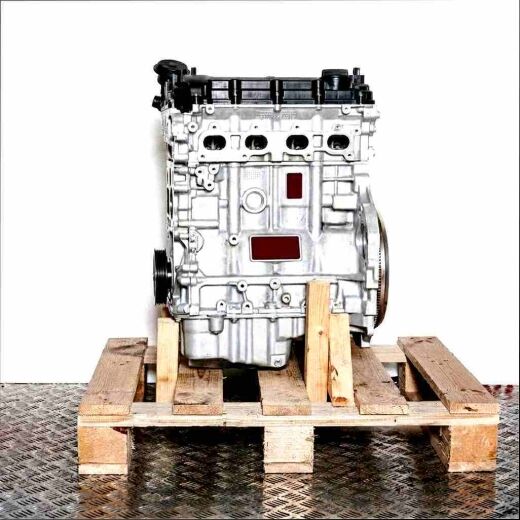 Side view of an N57 D30 B engine on a wooden pallet against a white background. The engine is vertically oriented.