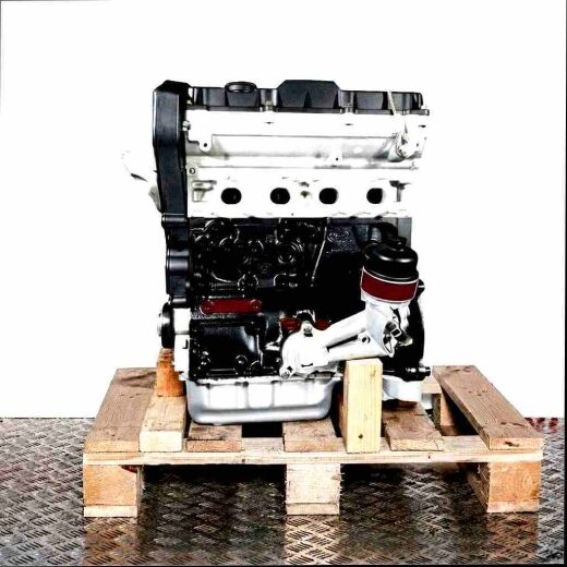 Side view of a complete NFU (TU5JP4) engine on a wooden pallet against a white background. The black and silver engine is vertically oriented.