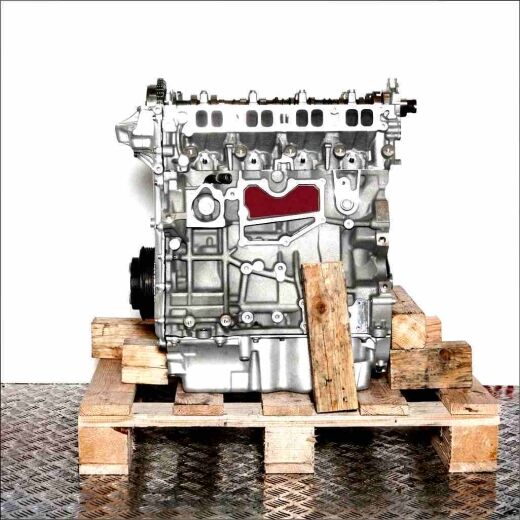 R9CD silver engine on a wooden pallet against a white background. The engine is shown from the side.