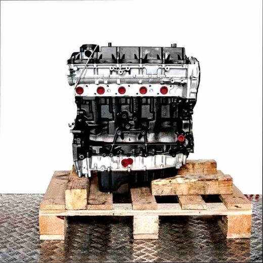 SA2W engine on a wooden pallet against a white background. The black engine block and silver cylinder head are visible from the side.