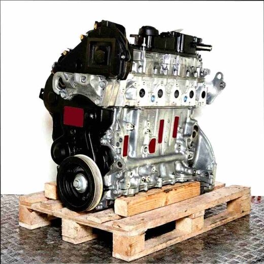 UGCB engine on a wooden pallet against a white background. Side view of the engine, showcasing all its components.