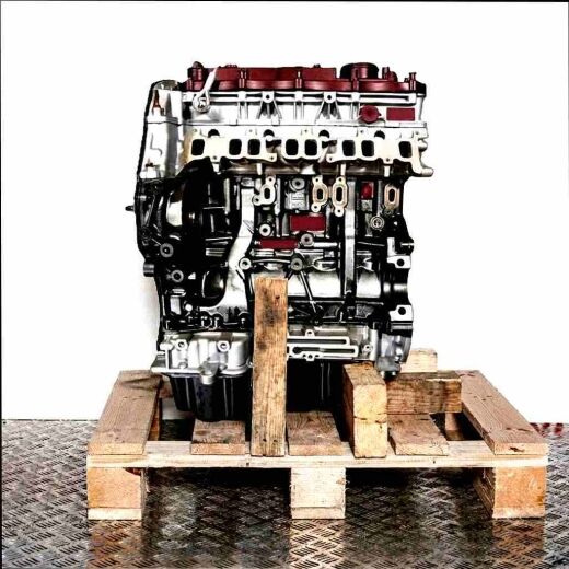 USR6 engine on a wooden pallet against a white background. The black and silver engine is viewed from the side.