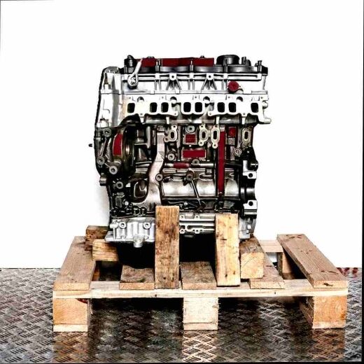 UYR6 engine on a wooden pallet against a white background. The silver and black engine is viewed from the side and stands upright.